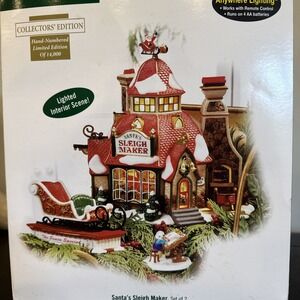 Dept 56 North Pole Santa's Sleigh Maker And Santa's New Sleigh. Collectors Editi